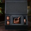 Complete Yixing Zisha Tea Set with teapot and cups in a premium gift box, a classic Yixing Purple Clay Tea Set ideal for gifting