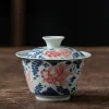 Close-up of an Antique Gaiwan with hand-painted goldfish and foliage motifs, a standout piece in the Best Gaiwan collection.