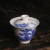 60ml Gaiwan with lid, a delicate Small Gaiwan featuring intricate blue and white landscape artwork, perfect for solo tea brewing.