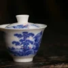 Close-up of a 60ml Gaiwan, a Small Gaiwan showcasing detailed hand-painted blue and white landscape designs.