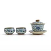 Porcelain Gaiwan Tea Set with a gaiwan and two cups, a clear product shot highlighting the detailed blue and white artwork.