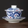 Dragon and Phoenix Auspicious Stoneware Gaiwan 165ml 17 Close-up of a Dragon Gaiwan, highlighting detailed blue dragon and phoenix artwork on a high-quality Stoneware Gaiwan body.