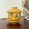 Handmade Gaiwan with hand-painted bird and lotus seed pod designs, a Vintage Gaiwan Tea Set ideal for traditional Chinese tea ceremonies.