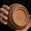 Bottom view of an Unglazed Gaiwan tea tray, revealing its hand-thrown concentric ridges and artisanal construction