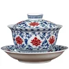 Complete Glazed Porcelain Gaiwan set with lid and saucer, featuring vibrant blue and red floral patterns on a white background.