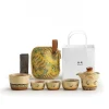 Full Travel Gaiwan tea set with all components, including the gaiwan, fairness pitcher, teacups, travel bag, and a gift bag, presented as a premium gift option for tea lovers.