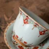 Ru Kiln Vintage Dunhuang Treasure Flower Gaiwan Tea Set 160ml 11 Close-up of the bowl of a Ru Kiln Gaiwan, featuring the signature crackled glaze and vibrant vintage floral motifs of this Vintage Gaiwan Tea Set.